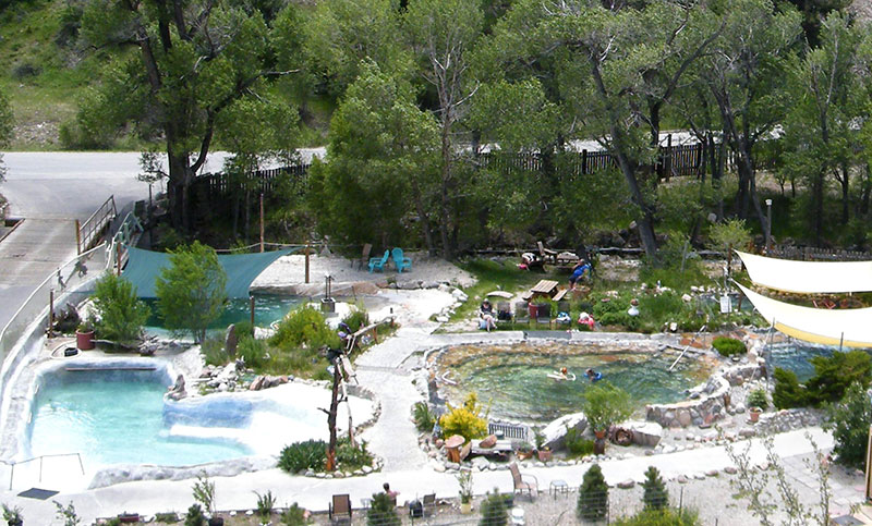 Aerial shot of a multi-level hot springs facility near Denver with natural stone landscaping